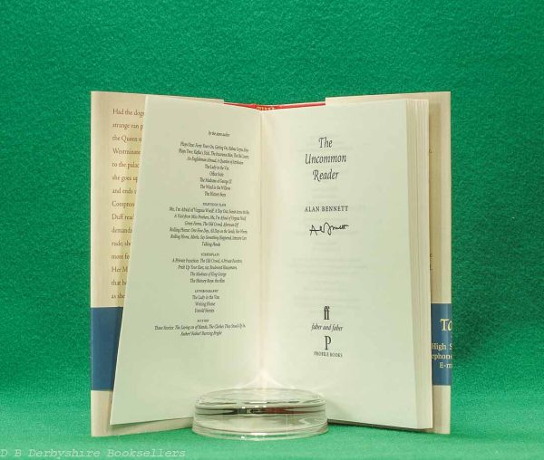 OLYMPUS DIGITAL CAMERA The Uncommon Reader by Alan Bennett | Faber & Faber / Profile Books, 1st edition 2007 | Signed | Topping & Company wrap-round belly band
